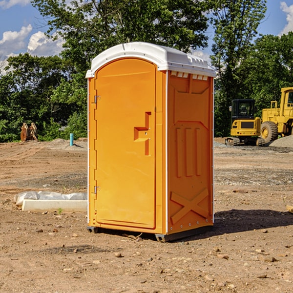 how often are the portable restrooms cleaned and serviced during a rental period in Exeter